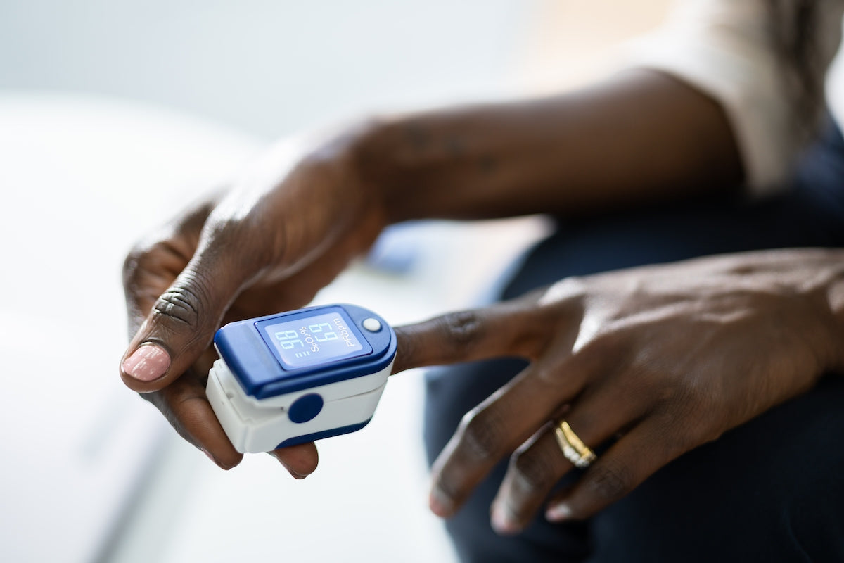 How To Read A Pulse Oximeter: Oxygen Levels, Usage & More