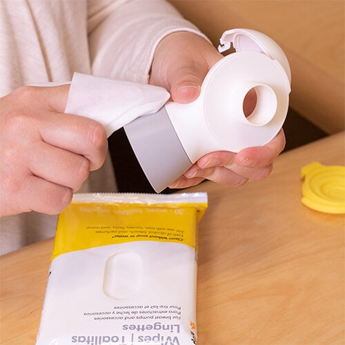 Cleaning breast bump parts with Medela Quick Clean™ Breast Pump & Accessory Wipes