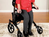 An older woman sitting on the Journey So Lite® Glide walker’s cushioned seat.