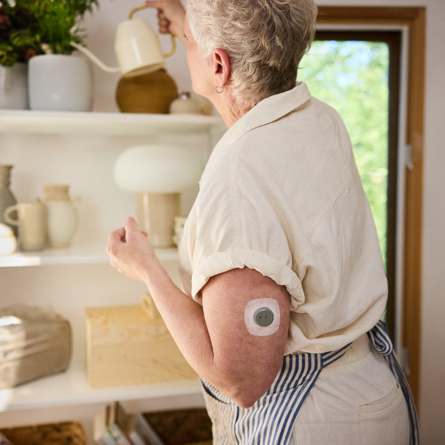 stelo sensor worn by flowershop owner